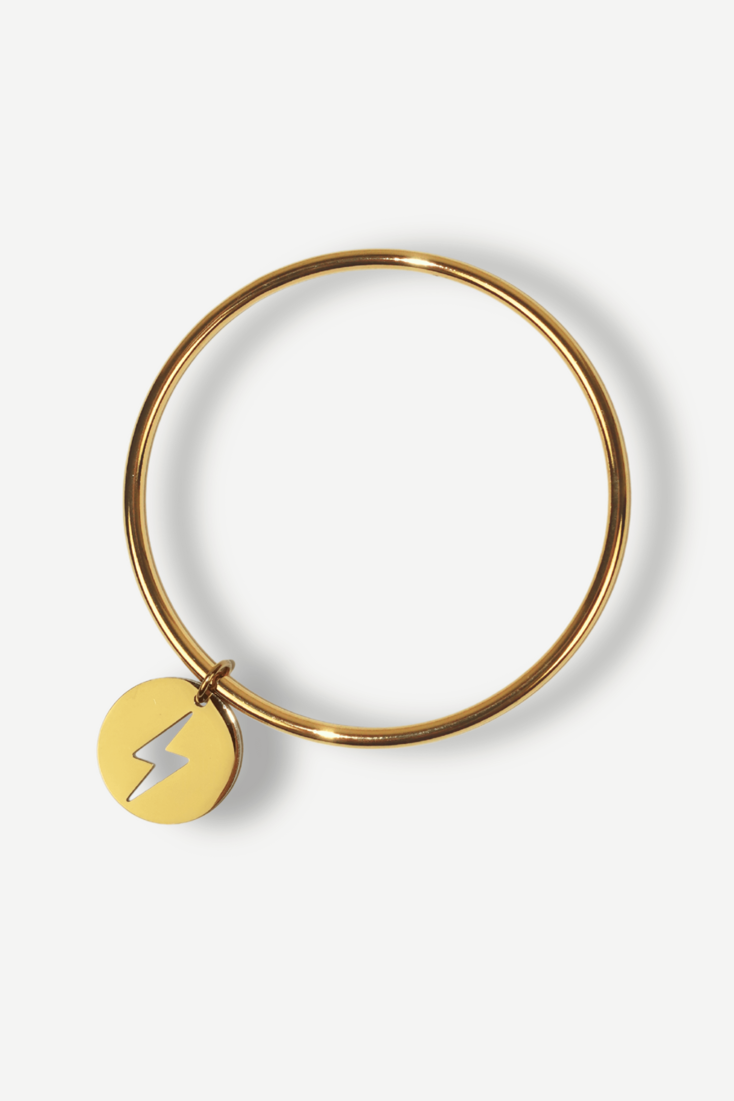 Bracelet jonc en acier inoxydable doré avec une breloque éclair. Taille unique, diamètre de 70 mm. Un accessoire raffiné pour sublimer votre poignet.