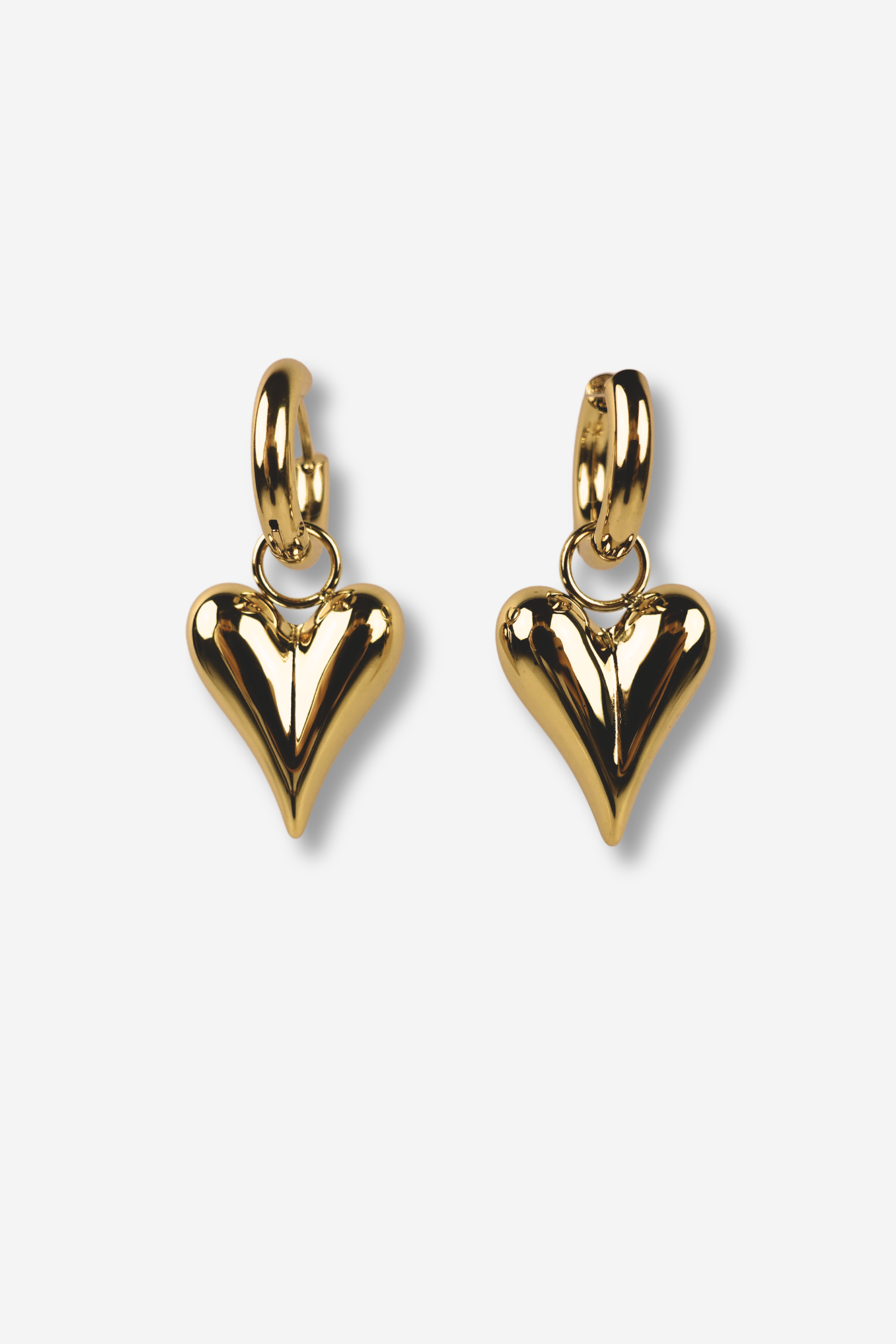 Boucles d'oreilles BE MINE créoles en acier inoxydable, cœur allongé et bombé, collection Sisters Bay.