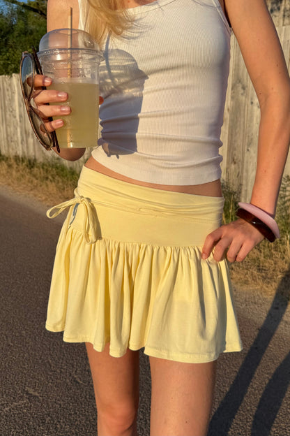 Jupe short jaune clair élastique femme – Taille unique XS à M | Sisters Bay