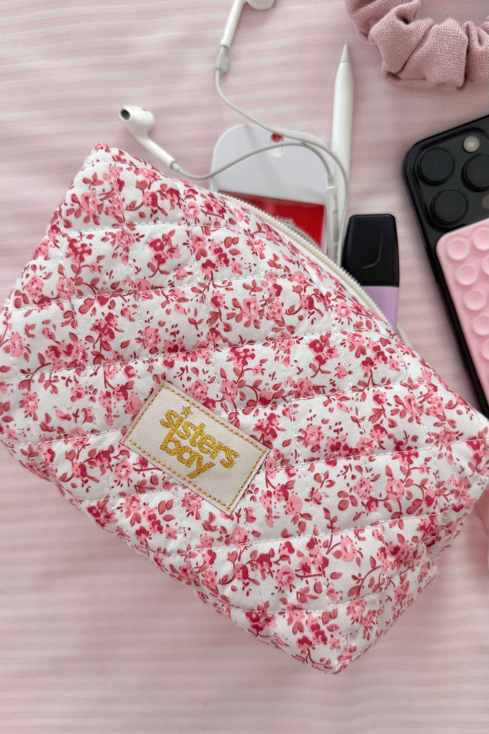 Trousse SISTERS BAY au motif fleuri rose, compacte (10 x 10 x 18 cm), idéale pour ranger stylos, maquillage ou accessoires de voyage.